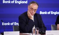 Pound slides as Bank of England holds interest rates in Britain