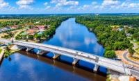Asphalt paving begins on new Wismar-Mackenzie Bridge