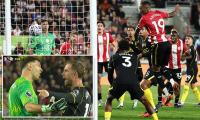 Jordan Henderson embroiled in tense on-field spat with Emiliano Martinez: Chelsea star exchanges words with new team-mate after first Brentford goal in shock 3-0 defeat
