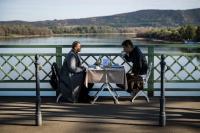 Hungarians and Slovaks share breakfast on Danube bridge that survived war and division