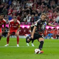 Kane blazes to 100 Bundesliga goals in record time
