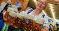 Munich’s Oktoberfest bursts into life as mayor taps first keg