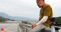 In 1998, Karl Bushby left Chile to walk home, and 28 years later, a Channel tunnel refusal stalled him; French approval may now let him swim home