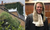 Britain's top planning barrister is locked in row with furious neighbours after putting up rooftop pergola at £3m London townhouse without planning permission