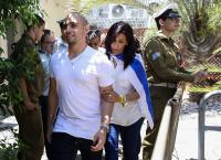 Israel's president pardons a combat medic whose shooting of a Palestinian attacker caused debate