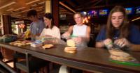 North Texas volunteers craft sandwiches for Feed The Country