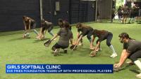 Professional players take part in Chicago girls softball clinic