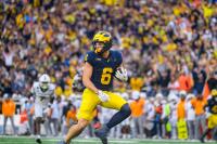 No. 19 Michigan overcomes first-half mishaps with second-half explosion, defeats UTEP, 52 – 17