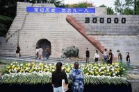 Japan warned against historical denialism