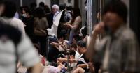 Japan disaster experts warn people not to travel unnecessarily during heavy rain