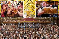 Germany’s Oktoberfest kicks off rowdy festivities as mayor taps first beer keg