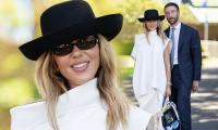 Pip Edwards and her new boyfriend Nicholas Nogarotto turn heads in monochromatic elegance at Royal Randwick's Surf to Turf Day in Sydney