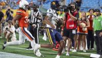 QB Michael Hawkins carries West Virginia to upset of No. 25 Virginia