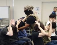 Japan foreign ministry draws flak over costumes used in anti-terror drill