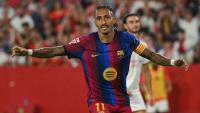 Hansi Flick heaps praise on Raphinha as Brazilian celebrates historic contract renewal in Barcelona's victory over Sevilla
