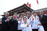 Flag-raising ceremony inspires Hong Kong and Macao delegates