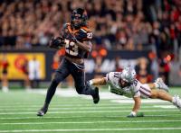 OSU thumps Montana, 52-17: ‘Start paying attention’
