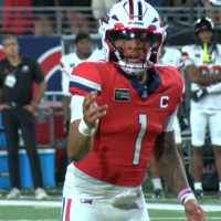 Fifita sets passing record, Wildcats race past Northern Illinois 42-17