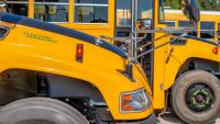 Massachusetts school debuts electric bus fleet beneath solar canopy set to save $2.33 million