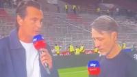 Manager holds back tears on live TV as he's told about tragic death of his friend