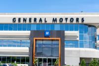 GM sat out the hybrid boom as gas prices rose, and dealers say it's losing buyers