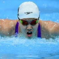 China swim sensation, 13, sets Games record after Japan win early