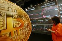 Crypto Stocks Jump as Bitcoin Reclaims $80,000; Woori Technology Investment Up 12%