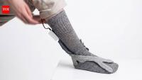 Italian students built a smart sock that turns favourite music into vibrations to help prevent Parkinson's walking freezes