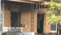 Firefighters Pull Two People from Baltimore Fire; One Dead