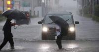 At least two killed as Typhoon Dujuan hits Japan