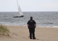 A Sailboat, and a Mystery, Off Main Beach