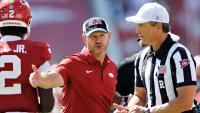 Why can't Arkansas football get its running game going?