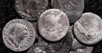 Amateur archaeologist finds Germany’s biggest cache of Roman silver coins