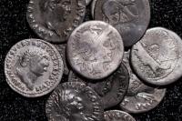 Amateur archaeologist unearths huge Roman silver coin treasure trove in Germany