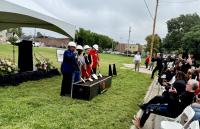 Mayor breaks into song, crowd cheers state-aided Nebraska market