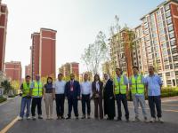 Al-Mashaan highlights transport infra at China forum, visits labor city