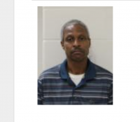 KCPD: Homicide suspect fired though security door of business