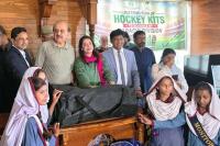 Commissioner distrubutes Hockey kits among  students of 74 schools