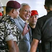 Malaysia furore after Najib wins conditional house arrest
