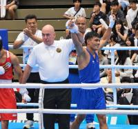 Khagendra advances to last 16 at Asian Games after defeating Macau boxer