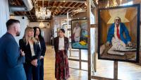 Photos: Trone Garriott visits Trump-Epstein exhibit in Des Moines