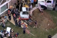 Kansas City fire crews rescue worker from trench