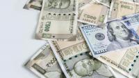 Rupee falls 12 paise to close at 95.74 against U.S. dollar