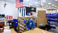 Business activity surges as inflation pressures build