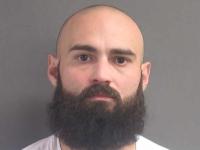 Florida garbage truck driver arrested after road-rage shooting, police say