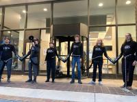 Nine animal rights activists arrested after chaining themselves to Kroger HQ
