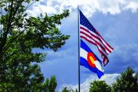 This flag pole was best left on the side of the road