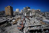 Race to evacuate war-damaged Gaza buildings after deadly apartment block collapse
