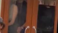 Moment couple filmed romping on packed tourist boat as horrified passengers watch through glass door in Venice