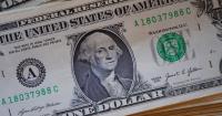 U.S. dollar jumps to near two-month high on Fed outlook, oil climb